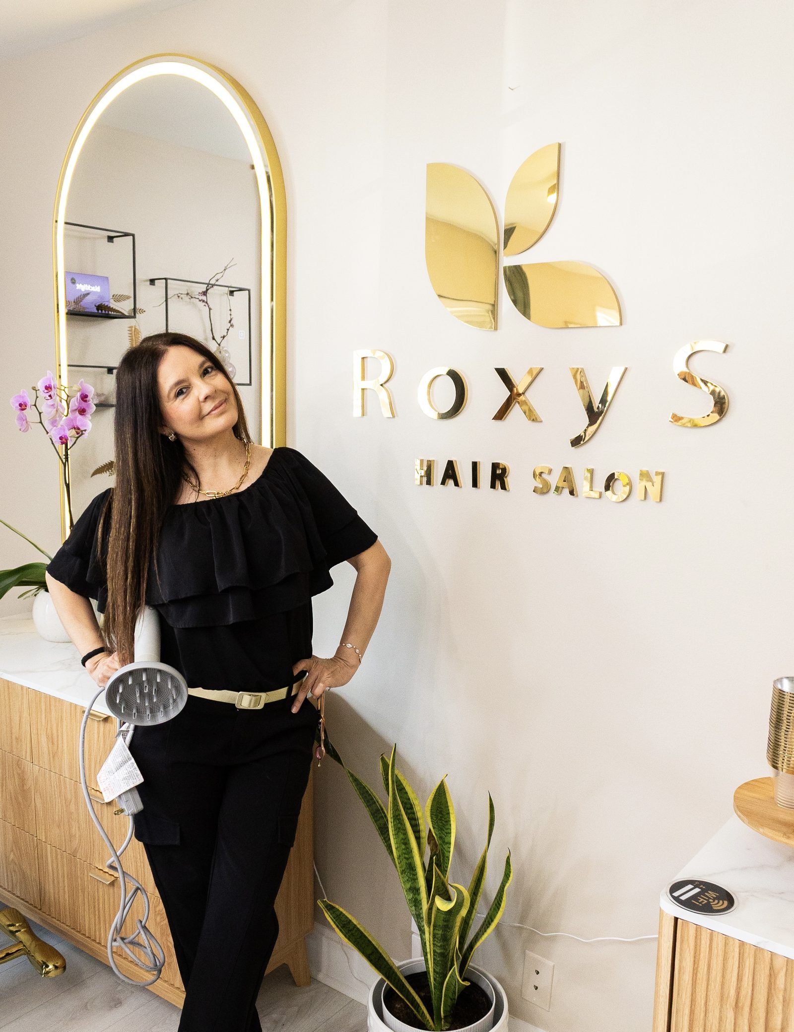 Roxana, owner and stylist of Roxy's Hair Salon